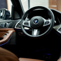 BMW X7 M50i in Alpine White with Tartufo Merino-Leather Interior